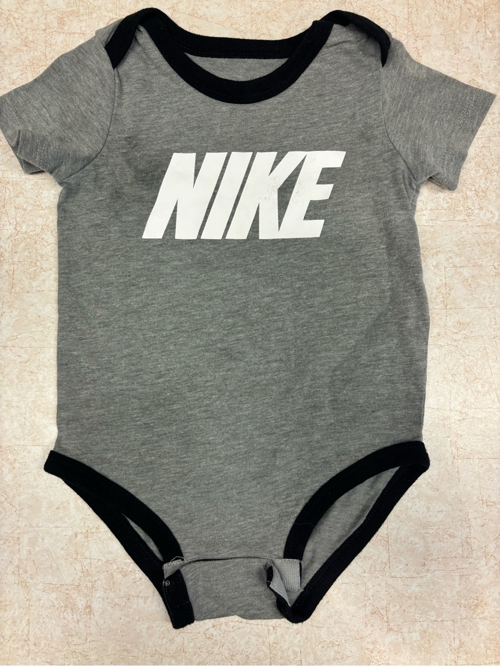 Nike Gray and Black Baby Bodysuit with White Logo